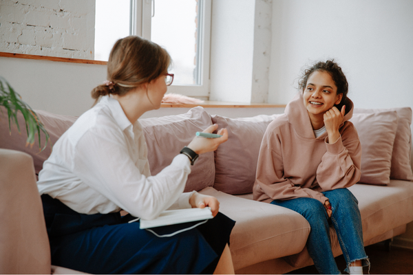 Clinician with teenager in therapy